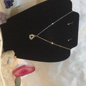 diamond heart necklace/teardrop diamond earrings.